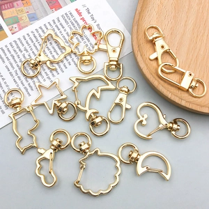 Goldene KC-Legierung Karabinerverschlüsse in Herz- und Sternform für DIY-Schmuck