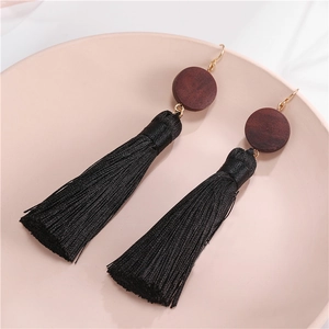 Bohemian black tassel earrings with vintage round wood pieces and golden hooks
