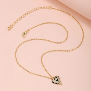 Elegante goldene Herz-Anhänger-Halskette mit schwarzer Emaille und Zirkonia-Besatz