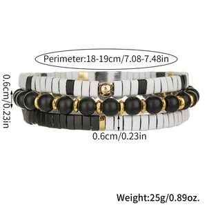 Juego de tres pulseras apilables de cuentas Tila en blanco y negro con toques dorados
