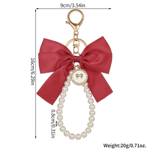 Large red silk bow keychain with pearl beads and gold lobster clasp for bags and keys