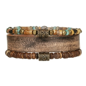 Close-up of bohemian multi-layer bracelet with brown leather and turquoise beads