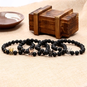 Set of four natural volcanic stone crown bracelets in gold, rose gold, silver and black