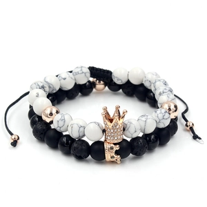 White turquoise and volcanic stone beaded bracelet set with sparkling crown charms