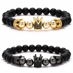 Detail of beaded crown bracelet set with black matte stones and sparkling dark crystals
