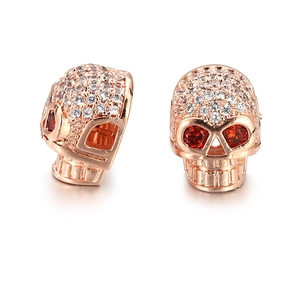 Rose gold skull beads with white zircon pave forehead and red gemstone eyes for DIY jewelry