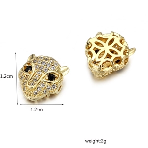 Macro detail of leopard head charm showing 1.2cm size, pavé zircon, and hollow back