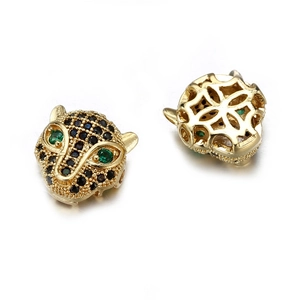 Golden leopard head charm with black zircon pavé and green gem eyes for jewelry making