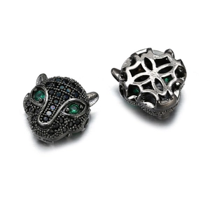 Leopard head bead in gunmetal finish with black micro-pavé crystals and green eyes