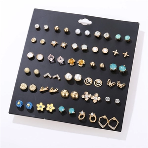 Detailed view of 30-pair fashion earring set featuring mixed geometric and pearl designs