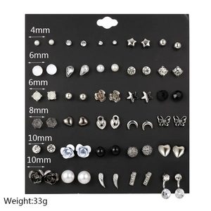 Set of 30 pairs assorted stud earrings on black card with sizes 4mm to 10mm and weight 33g