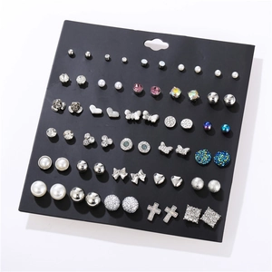 Detailed set of 36 pairs assorted stud earrings with pearls and crystals on black card
