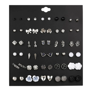 Detailed close-up of 36 pairs earring set featuring pearls, crystals and varied shapes