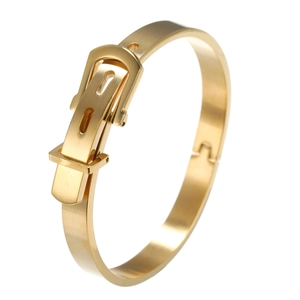 Gold titanium steel bracelet featuring a belt buckle design and brushed metal finish