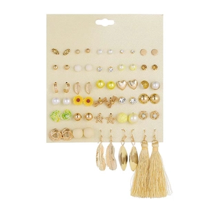 Collection of 30 assorted gold-tone earrings with pearls, leaves and floral charms