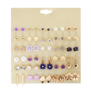 Detail of 30 pairs earring set featuring pearls and crystals on display card