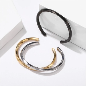 Minimalist C-shape stainless steel cuff bracelets in gold, silver, and black finishes