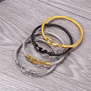 Rose gold and silver cable bracelets with horseshoe shackle clasps in various finishes