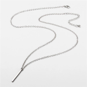 Detailed view of polished stainless steel bar pendant with lobster clasp and adjustable chain
