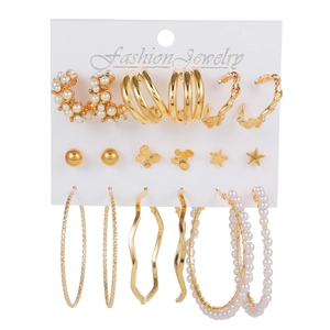 9-piece gold butterfly and pearl earring set with large hoops and small studs