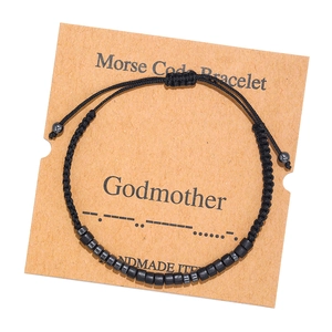 Handmade Morse code bracelet for Godmother with black beads on a minimalist card