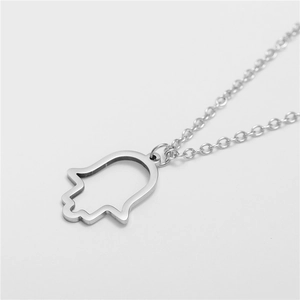 Silver stainless steel Hamsa Hand pendant necklace with minimalist hollowed outline design