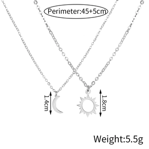 Detail view of silver sun and moon friendship necklaces with size dimensions and weight