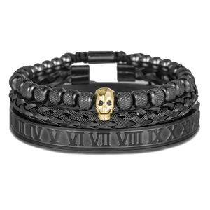 Set di 3 bracciali neri con teschio dorato, numeri romani e cinturino intrecciato