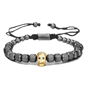 Pulsera de hombre con calavera de circón dorado y cordón trenzado ajustable