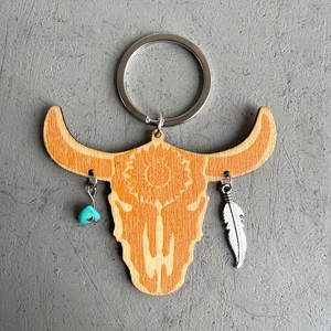 Bohemian bull head wooden keychain with turquoise beads and metallic feather pendants
