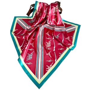 Western style square silk scarf with red base featuring elephant, skull and cactus prints