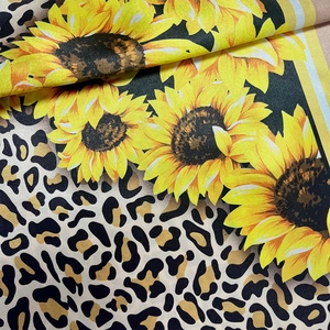 Fashionable silk-like scarf featuring sunflower and leopard print with twill texture