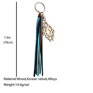 Porte-clés en bois fer à cheval aztèque avec pompons colorés et pendentif géométrique