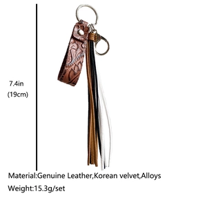 Vintage brown leather keychain with embossed tassel and metal ring for women