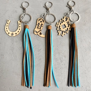 Porte-Clés à Gland Cowboy de l'Ouest Avec Pendentif en Bois Fer à Cheval Botte Géométrique Bohême Frange en Suède Sac Femme