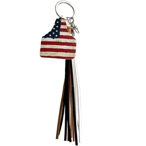 Western cowboy style leather keychain with US flag ear tag and multi-color tassels