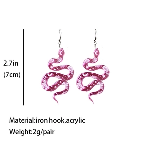 Floral snake-shaped pink acrylic earrings with celestial patterns and silver hooks
