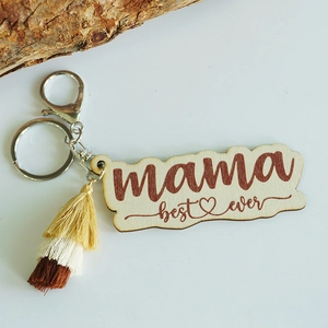 Close-up of wooden mama best ever keychain with three-tone gradient fringe tassel