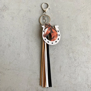 Western horseshoe keychain with horse head illustration and colorful long leather tassels