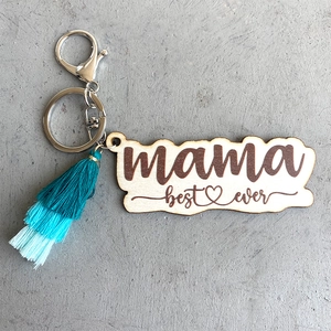 Detail of wooden mama best ever keychain with silver ring and blue gradient tassel