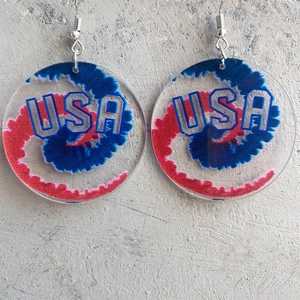 USA flag style acrylic drop earrings with red and blue spiral pattern for festival