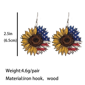 Western wooden earrings with American flag and sunflower pattern on a plain white background