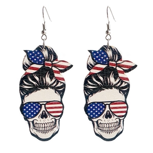 Skull earrings with messy bun and American flag bow for Independence Day fashion