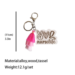 Nurse life keychain with leopard heart icon, pink tassel, and wooden pendant design
