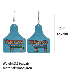 Western oorbellen met luipaardprint van turquoise hout en ijzeren details