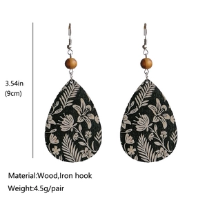 Ethnic teardrop earrings with floral print on wood and iron hooks in 9cm length