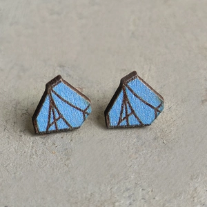 Handcrafted wooden geometric stud earrings featuring blue tent pattern and mountain texture