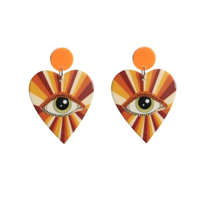 Retro heart eye drop earrings with pop art disco style and colorful acrylic design