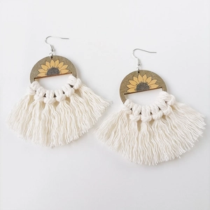 Bohemian sunflower wood earrings with cream cotton tassels and woven details