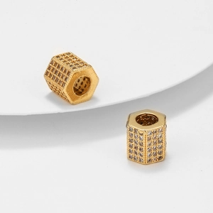 Micro-pave hexagon spacer beads in gold plated copper with sparkling cubic zirconia